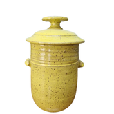 handmade ceramic fermentation pot with a lid on a white background