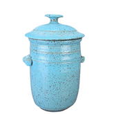 handmade ceramic jar with a lid on a white background