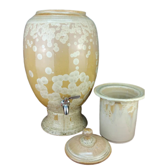 handmade ceramic water pot with crystalline glaze on a white background