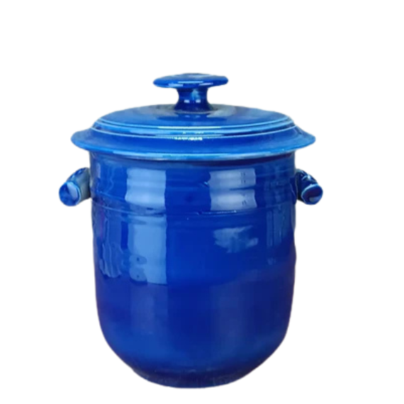 Blue handmade ceramic fermentation pot with lid on a white background