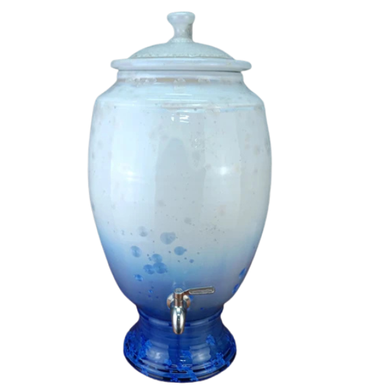 White crystalline ceramic water dispenser with blue base on a white background