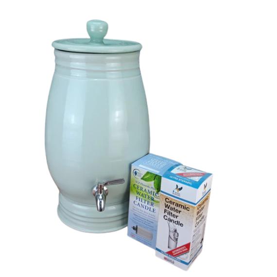 handmade ceramic water filter with a box labeled 'Ceramic Water Filter Candle' on a white background.
