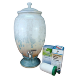 Ceramic water filter with a packaging box on a white background